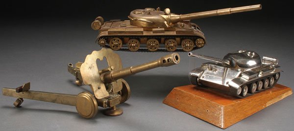 RUSSIAN SOVIET HAND MACHINED MILITARY MODELS: AN INTERESTING GROUP OF THREE RUSSIAN SOVIET MACHINED MILITARY MODELS, CIRCA 1975. Comprising a brass machined artillery cannon with articulating parts, a brass machined tank with rotating turret and 