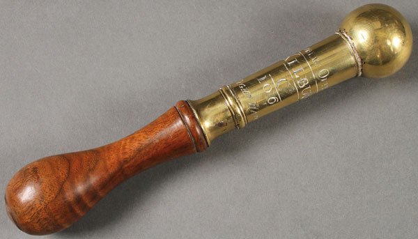 A 19TH CENTURY ENGLISH BRASS TIPSTAFF OR BLACKJACK.: A 19TH CENTURY ENGLISH BRASS BLACKJACK, TIPSTAFF OR SAP. The tapering cylindrical brass shaft with weighted bulbous terminal engraved “Public Office, Kilburn, Ce/106 Night Watch” above a mounted