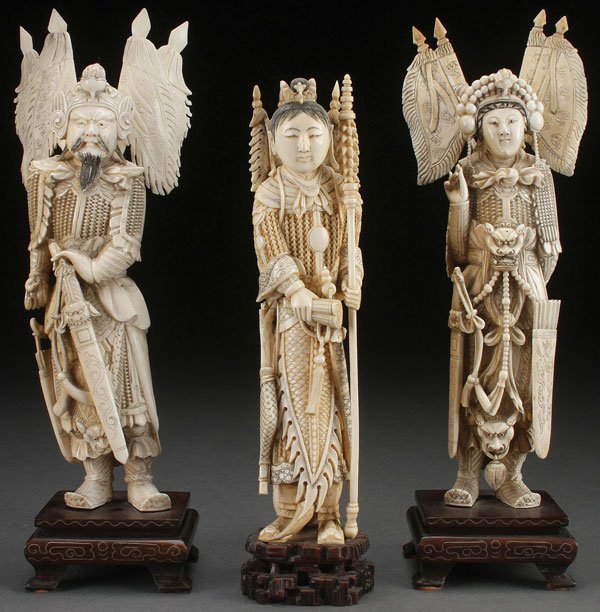 3 CHINESE CARVED IVORY WARRIOR FIGURES, C 1925: A GROUP OF THREE CHINESE CARVED IVORY WARRIOR FIGURES, CIRCA 1925. Each well carved in good detail and with layered woven armor and various arms and other accoutrements including battle flags comprisi