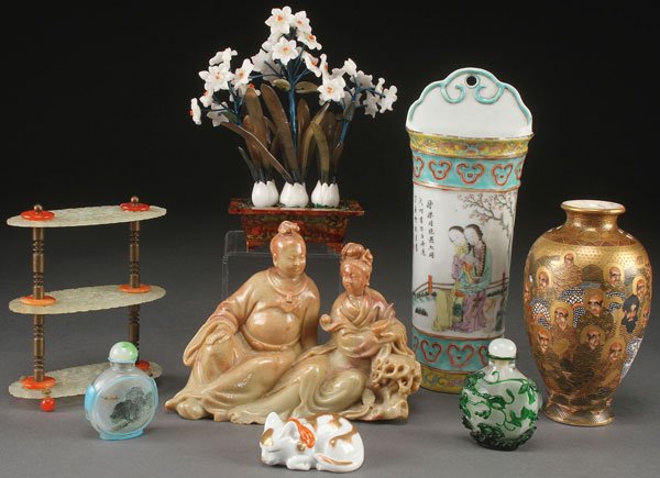 8 PC GROUP OF CHINESE & JAPANESE DECORATIVE ARTS: AN EIGHT PIECE GROUP OF CHINESE AND JAPANESE DECORATIVE ARTS, LATE 19TH AND 20TH CENTURY. Comprising a three tiered pierced hardstone, bronze and carnelian agate stand, a carved hardstone floral group