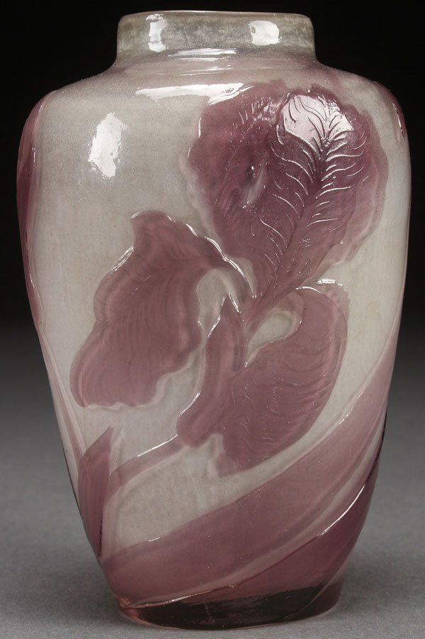 GALLE FRENCH “FIRE POLISHED” CAMEO ART GLASS VASE: A GALLE FRENCH “FIRE POLISHED” CAMEO ART GLASS VASE, LATE 19TH CENTURY. Engraved opalescent glass, overlaid with amethyst, cut with a design of iris under a fire polished finish. Signed in cameo �