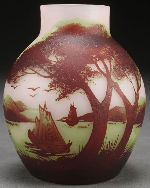 FRENCH OR AUSTRIAN CAMEO ART GLASS VASE: A RASPILLER CAMEO ART GLASS VASE, EARLY 20TH CENTURY, PROBABLY BY LOETZ. Of bulbous form in gray colored glass, overlaid with green and brown, cut with a tree lined lake shore. Signed in cameo “RAS