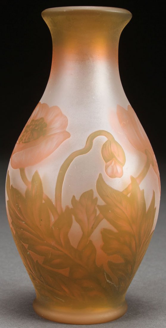 A FRENCH CAMEO ART GLASS VASE, CIRCA 1900: A FRENCH CAMEO ART GLASS VASE, CIRCA 1900. Of bulbous form in gray colored glass, overlaid with peach and olive, cut with the design of florals. Indistinguishably signed in cameo “C. VESSIERE? NANC
