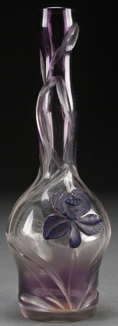 A MOSER AUSTRIAN ART GLASS VASE, LATE 19TH C: A MOSER AUSTRIAN ART GLASS VASE, LATE 19TH CENTURY. In amethyst shaded glass, intaglio carved with iris blossoms and elongated leaves and further decorated with an applied and carved blue and amethyst