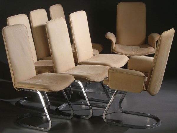 CLAUDIO BELLINI FOR DE SEDE SWISS LEATHER CHAIRS: CLAUDIO BELLINI (ITALIAN b. 1963) FOR DE SEDE SWITZERLAND, A SET OF EIGHT GOAT SKIN AND CHROME DINING CHAIRS. Comprising two arm chairs and six side chairs raised on curved, flat, chrome bar supports