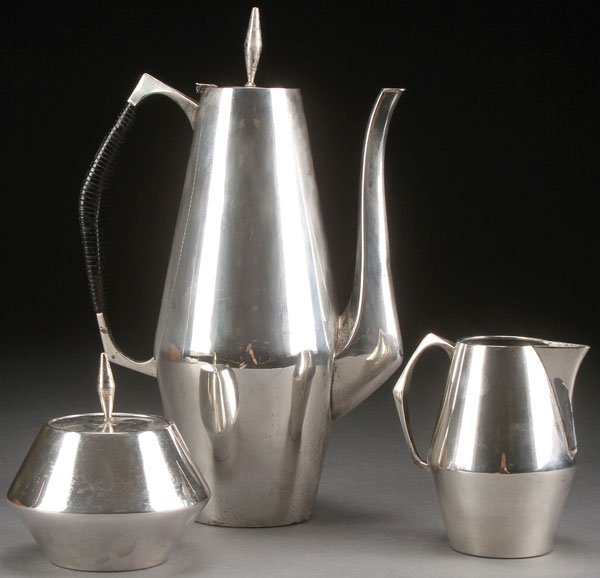 GIO PONTI FOR REED & BARTON STERLING SET THE DIAMOND: GIO PONTI (ITALIAN 1891-1979) FOR REED & BARTON, STERLING “THE DIAMOND” THREE PIECE COFFEE SERVICE. Comprising a coffee pot with leather wrapped handle, creamer and covered sugar. Each piece mark