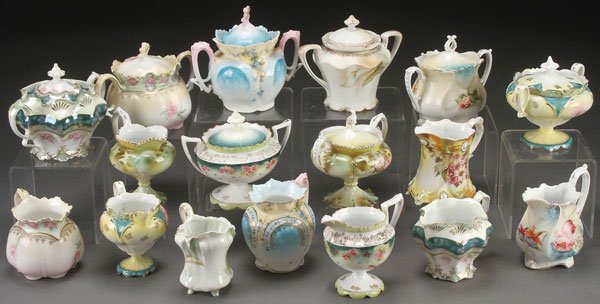 A 17 PIECE GROUP OF R.S. PRUSSIA AND GERMANY: A 17 PIECE GROUP OF R.S. PRUSSIA AND GERMANY CREAM AND SUGARS, CIRCA 1900. Comprising seven matched sets, together with three odd pieces, in various molds and decoration. Most with red R.S.P. mark and
