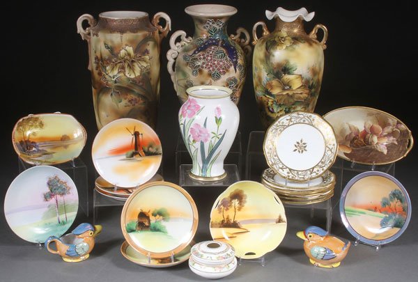 23 PIECE JAPANESE, NIPPON PORCELAIN AND POTTERY: A 23 PIECE GROUP OF JAPANESE, NIPPON PORCELAIN AND POTTERY, MOSTLY EARLY 20TH CENTURY. Comprising three large Royal Nippon vases, an Art Deco figural bird cream and sugar, six matching gold decorated 