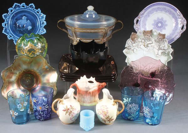 A 17 PIECE GROUP OF COLLECTIBLE GLASS AND PORCELAIN: A 17 PIECE GROUP OF COLLECTIBLE GLASS AND PORCELAIN, EARLY TO MID 20TH CENTURY. Comprising a blue opalescent baby chicks plate, a Fry art glass covered baking dish, a Wedgwood “Maud” under plate, 
