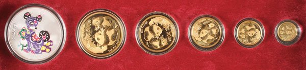 A 2006 CHINA PANDA GOLD AND SILVER LUNAR PROOF: A 2006 CHINA PANDA GOLD AND SILVER LUNAR PREMIUM PROOF SET. Contained in original packaging with five gold pandas, total weight 2.05 troy ounces and a 1 ounce silver colorized proof coin. IMPORTANT NO