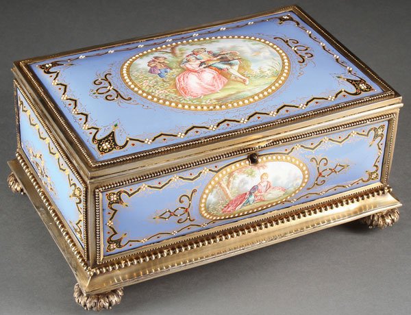 LARGE CONTINENTAL ENAMELED JEWELRY BOX, 19TH C: A LARGE AND IMPRESSIVE CONTINENTAL ENAMELED JEWELRY BOX, 19TH CENTURY. Resting on four rosette bun feet with flared base beneath a beaded border, each panel enameled with strap works and jewels on a r