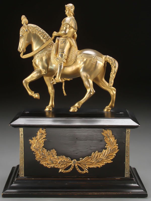 GRAND TOUR GILT BRONZE EQUESTRIAN STATUE 19TH C.: A GRAND TOUR GILT BRONZE EQUESTRIAN STATUE OF COLLEONI AFTER VERROCCHIO, 19TH CENTURY. Finely sculpted with gilt patina and mounted on a substantial ebonized wood base with applied gilt decorative ele