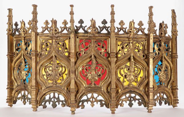 NEO GOTHIC CARVED & GILT WOOD BALDACHINO 19TH C.: A NEO GOTHIC CARVED AND GILT WOOD BALDACHINO OR CANOPY, 19TH CENTURY. Finely carved with Gothic arches and spires, the backside later set with colored glass. Height 22.5 inches (57 cm), width 38 inche