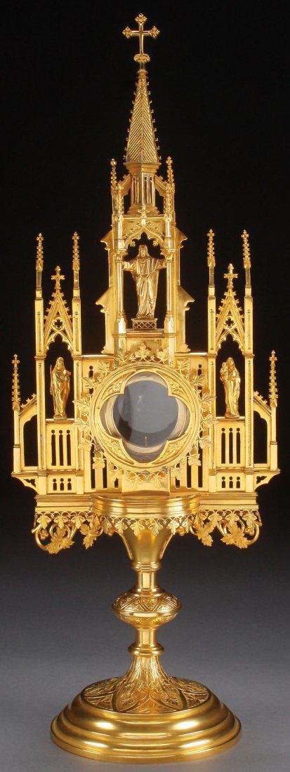 A GILDED GOTHIC STYLE MONSTRANCE, BILLAUX GROSSE: A GILDED GOTHIC STYLE MONSTRANCE, BILLAUX GROSSE, BRUXELLES, BELGIUM, CIRCA 1900. Rising from a domed stepped base with engraved floral from which is set the stem with large compressed spherical node 