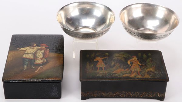 A PAIR OF RUSSIAN LACQUER BOXES, CIRCA 1900-1950: A PAIR OF RUSSIAN LACQUER BOXES, CIRCA 1900-1950. Comprising a box with hinged lid decorated with peasant courting scene and the interior in red, unsigned, length 6.5 inches (16.5 cm). Together with a