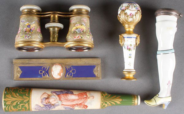 5 PORCELAIN, ENAMELED, AND GILT BRONZE OBJECTS: A GROUP OF FIVE PORCELAIN, ENAMELED, AND GILT BRONZE MOUNTED OBJECTS, FRENCH, 19TH CENTURY. Comprising a pair of French gilt metal opera glasses, the tubes enameled with amorous scene and with mother-