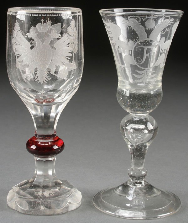 A PAIR OF AUSTRIAN FOOTED GOBLETS, 18TH/19TH C: A PAIR OF AUSTRIAN FOOTED GOBLETS, 18TH/19TH CENTURY. Comprising a footed goblet engraved with the Imperial double-headed eagle and cypher of Francis I, the second with deep intaglio carved Imperial e
