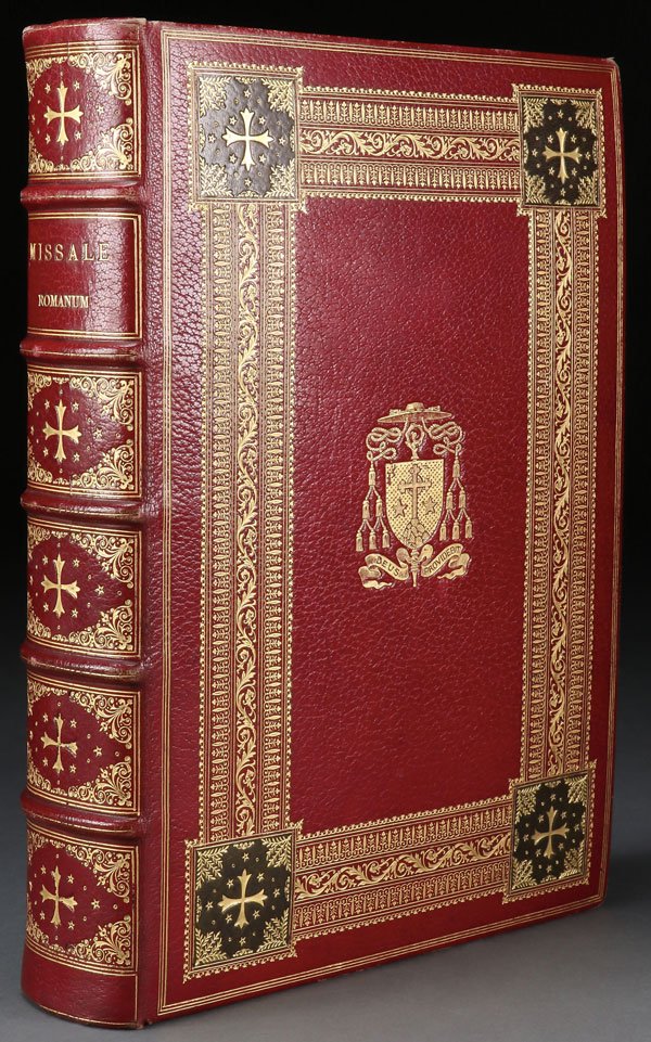 A CASED EPISCOPAL PRESENTATION ROMAN MISSAL: AN EXCEPTIONAL CASED EPISCOPAL PRESENTATION ROMAN MISSAL, RATISBOANE, ROME, 1899. The large altar missal in red leather covers with ornate impressed gilt borders and spine, the front cover with impres