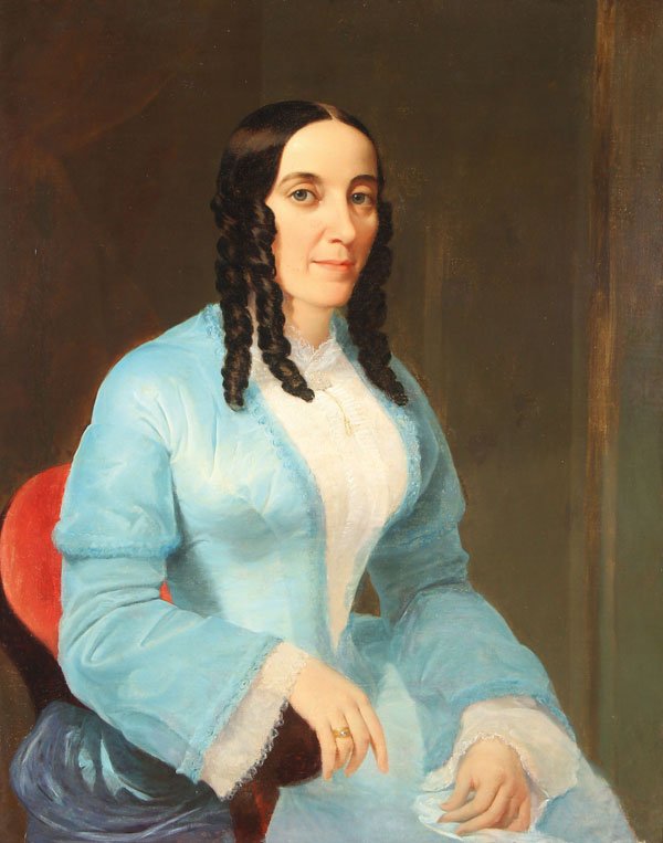 A 19TH CENTURY PORTRAIT PAINTING OF A WOMAN: BRITISH OR AMERICAN SCHOOL (19th century)A Portrait of a Woman in Blue Dress with Sausage Curls – circa 1850Oil on canvas laid down on masoniteApparently unsigned36 inches x 28.25 inches (91 x 72 c