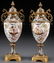A PAIR OF FRENCH ENAMELED BRONZE AND PORCELAIN