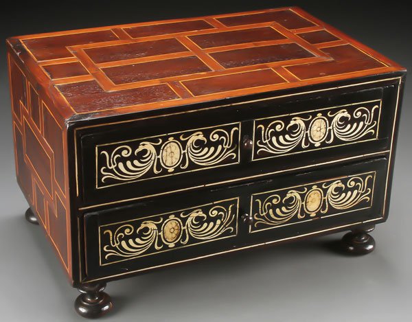 AN EARLY 19TH CENTURY MARQUETRY AND BONE INLAID: AN EARLY 19TH CENTURY MARQUETRY AND BONE INLAID TWO DRAWER DRESSER BOX. Mahogany and satin wood over a pine frame, inlaid in a geometric design, the drawer fronts inlaid with gothic style scrolled fig
