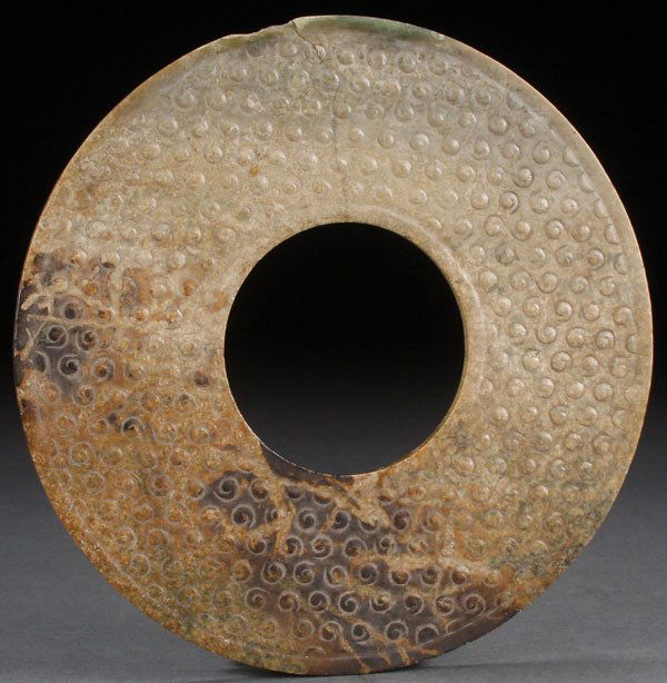 AN ARCHAIC CHINESE CARVED JADE BI, PROBABLY YUAN (1 of 5)