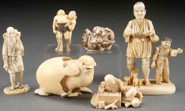 A GROUP OF SIX JAPANESE CARVED IVORY OKIMONOS (1 of 2)
