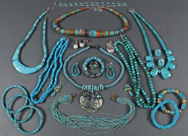 A 22 PIECE GROUP OF CONTEMPORARY TURQUOISE: A 22 PIECE GROUP OF CONTEMPORARY TURQUOISE JEWELRY. Of various size shape and style, the majority with silver mounts. Comprising a multi-strand choker, a nugget necklace, a graduated and shaped choker