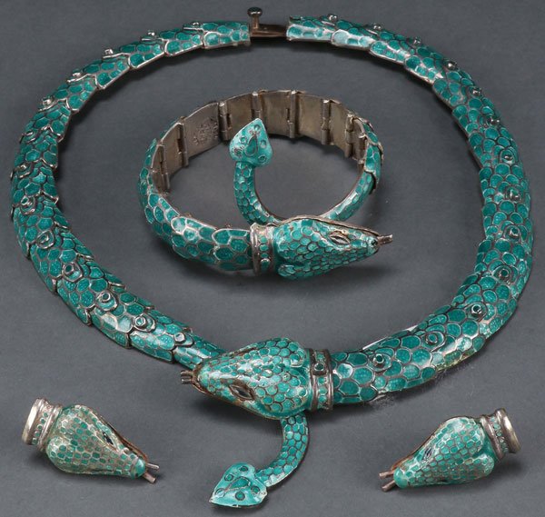 A FINE MELICIO RODRIGUEZ TAXCO ENAMELED SILVER: A FINE MELICIO RODRIGUEZ TAXCO ENAMELED SILVER JEWELRY SUITE, MID 20TH CENTURY. Comprising a snake form choker necklace with reticulating links enameled in turquoise, a matching bracelet, and pair of 