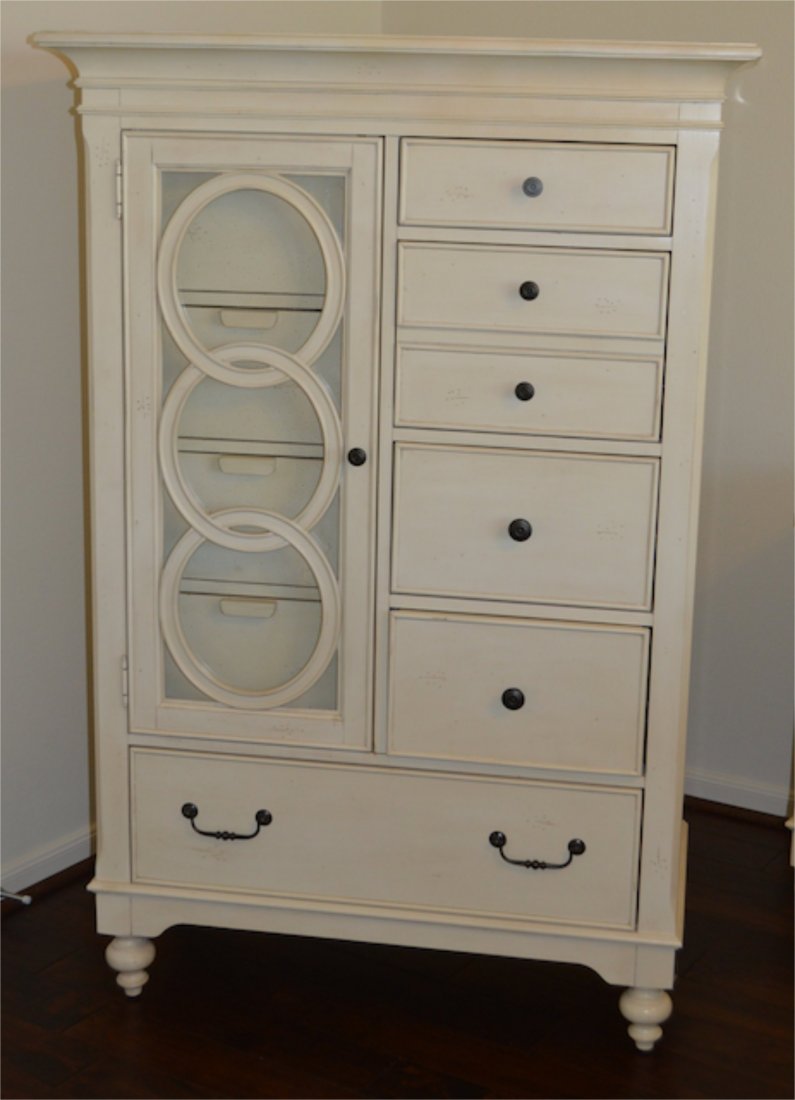 New: Howard Miller Vintage Cottage Glass Door Chest: New Never Used! Howard Miller Vintage Farmhouse Cottage Collection Glass Door Chest. Model Number 941402VI. Vintage Ivory Finish and Artistic Distressing. Antique bronze hardware. Seeded glass doors w