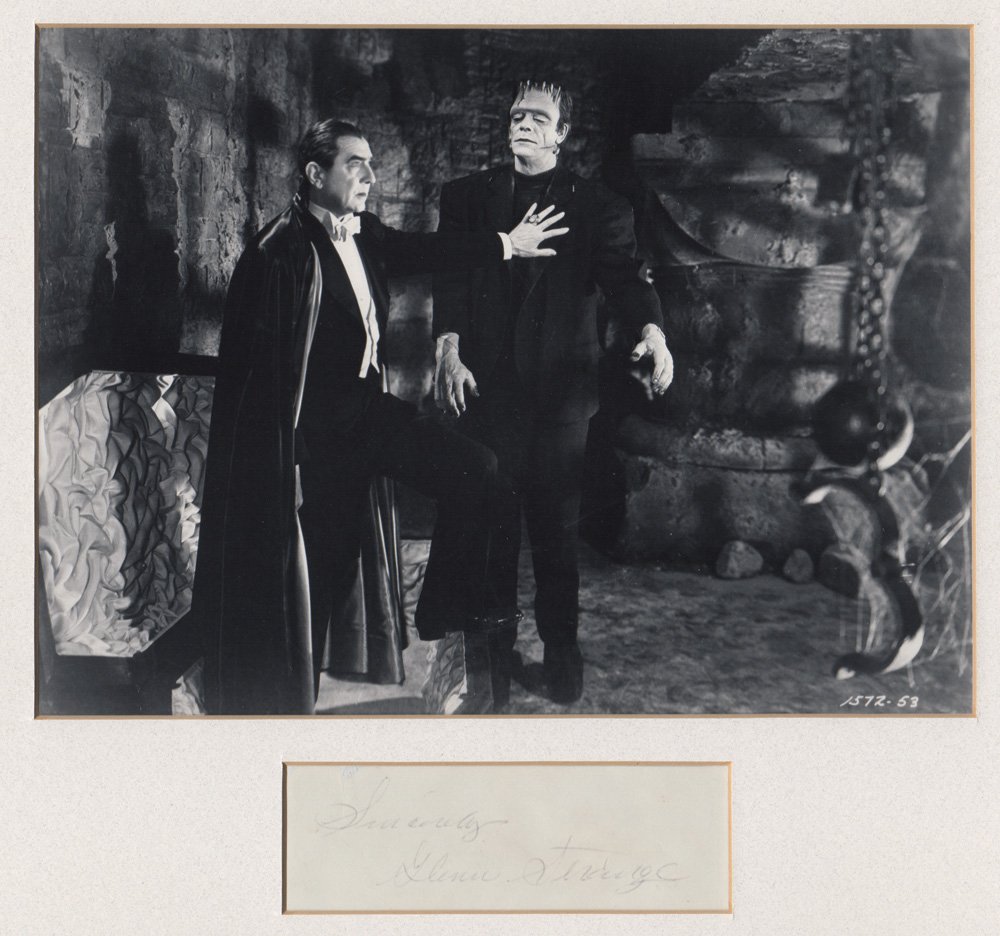 Glenn Strange Autograph: Glenn Strange Autograph. Matted with black & white 8" x 10" photo still featuring Glenn Strange as "The Monster" and Bela Lugosi as "Dracula." Strange, a cowboy actor and stuntman, was discovered by m