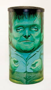 Frankenstein Garbage Can With Vacuum-formed Lid: Vintage Frankenstein Garbage Can With Original Vacuum-formed Lid. Measures 16" tall with an 8 1/4" diameter, the can exhibits a terrific artist rendering of Frankenstein that encompasses the entire ou