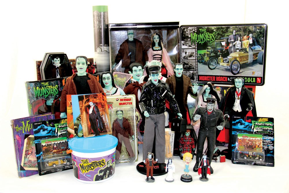 Magnificent Munsters Collection: Magnificent Munsters Collection. This lot includes over 35 pieces, including a Barbie Collectors Edition set of dolls that features Herman and Lily as Ken and Barbie. Also includes action figures, pos