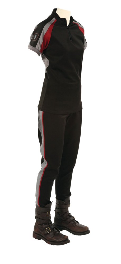 District 5 Male Training Costume: District 5 Male Training Costume from The Hunger Games. Worn by Chris Mark as the male tribute from District 5 while in the training center. Complete hero costume consists of a custom-made two-piece t