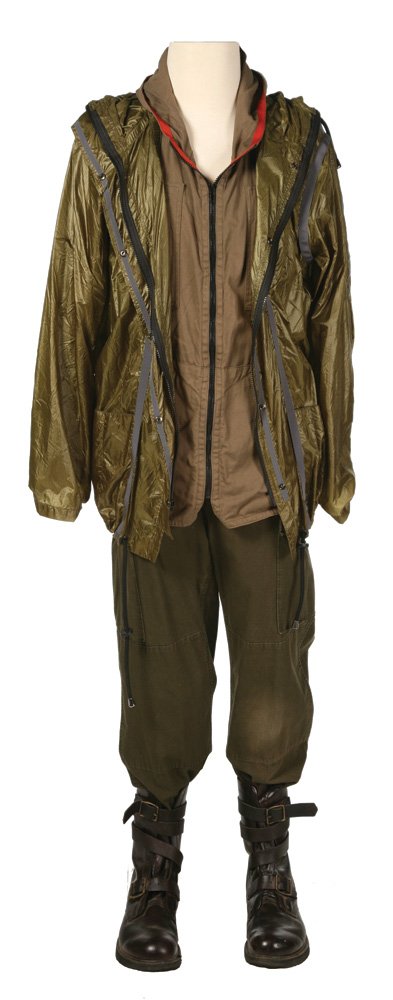 Marvel Arena Costume: Marvel Clean Arena Costume from The Hunger Games. Worn by Jack Quaid as Marvel, the male tribute from District 1, during the early stages of the Hunger Games. Hero costume includes a green arena jacke
