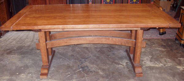 Contemporary Design Harvest Dining Table: Arts & Crafts Style. Good Over All Condition Sides Open for Leaf Inserts. Some Wear & Small Age Separation Cracks on Top, but hardly noticeable. Bought from Slifer Design in Vail, CO for over