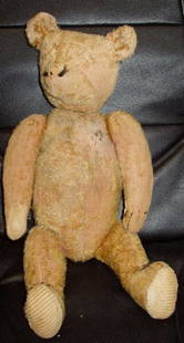 Antique Steiff (?)Bear: I think this is a Steiff, not sure. Shows Wear. Some areas have had some stitching repair. Missing eyes, nose, mouth. 7 1/2"w x 4"d x 17"h.