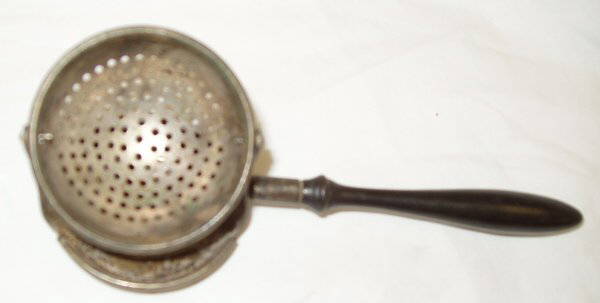 Antique Silver Plate Tea Strainer Wood Handle: Maker Unknown 6 1/2"w x 2 1/4"d x 2"h.