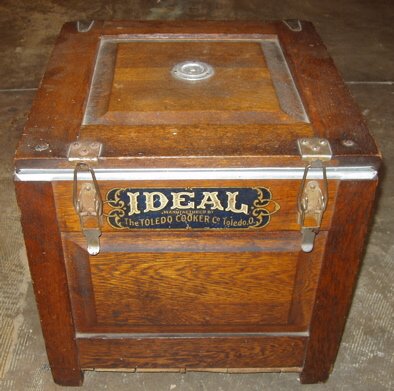 Antique Ideal Toledo Cooker Company Oak Box: Raised panels and inserts. 17"w x 16 1/2"d x 15 1/4"h. Custom Crating & Shipping Available.