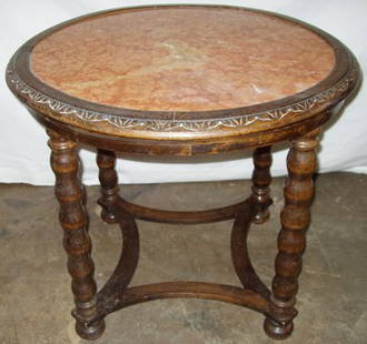 Round Marble Top Table with Carved Apron: Small repair on apron. Solid construction. Marble is in good condition. 27 1/2"dia x 23 3/4"h. Custom Crating & Shipping Available.