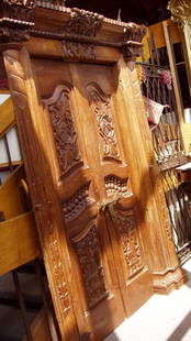 Indo Chinese Carved Palace Teakwood Door: Heavily Carved. 67"w x 9"d x 92"h. Custom Crating & Shipping Available.