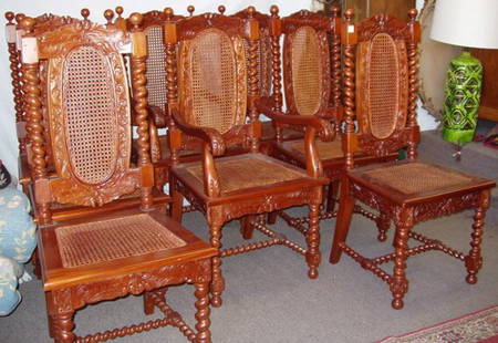 Carved Mahogany Dining Room Chairs Cain Seats: 8 Mahogany Reproduction Dining Room Chairs. Heavily carved with Cain seats and backs. Rope twist spirals. 2 Armchairs: 20 1/2"w x 31"d x 44 1/2"h. 6 Side Chairs: 19 1/4"w x 17 1/4"d x 43