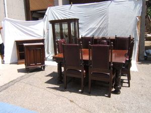 Antique Victorian Dining Room Set Heavily Carved: "Antique 12 Piece Victorian Dining Room Set Heavily Carved with brass griffins escutcheon. The design is flower motif with leaves. This is a gorgeous dining room set. This large massive dining room se