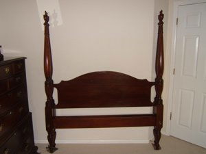 Craftique Furniture Co. Four Poster Bed: Queen size bed with mahogany rails. Four poster design. English mahogany stain. Shows some wear. Solid mahogany. Approx. size is 64"w x 76 3/4"h. Head board and Foot board.
