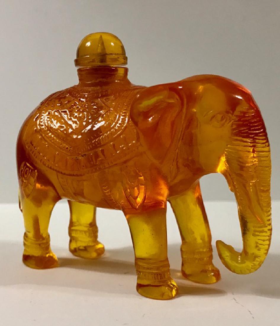 Ornate Carved Chinese Amber Elephant Snuff Bottle: Ornate Carved Chinese Amber Elephant Snuff Bottle