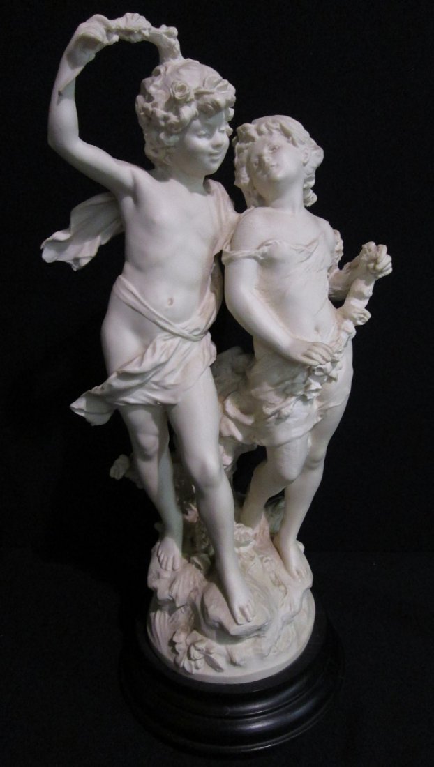 signed Auguste Moreau marble composite boy & girl: 22" high, not sure of material, perhaps parian or marble composite