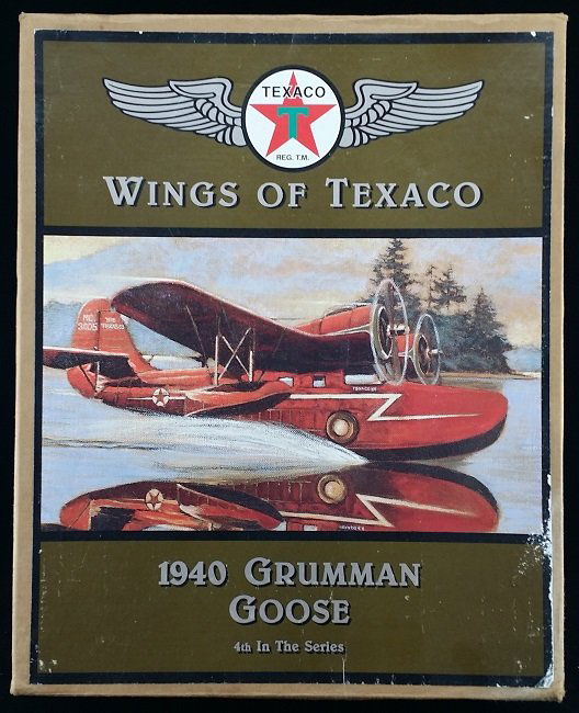 WINGS OF TEXACO 1940 GRUMMAN GOOSE DIE CAST BANK: BRAND NEW 1996 EDITION WINGS OF TEXACO 1940 GRUMMAN GOOSE DIE-CAST METAL COIN BANK. AUTHENTICALLY SCALED TO REPLICATE THE GRUMMAN GOOSE. HIGHLY DETAILED WITH LANDING GEAR AND ROTATING PROPELLERS. COME