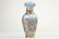 A fine gold mounted French enamel perfume bottle