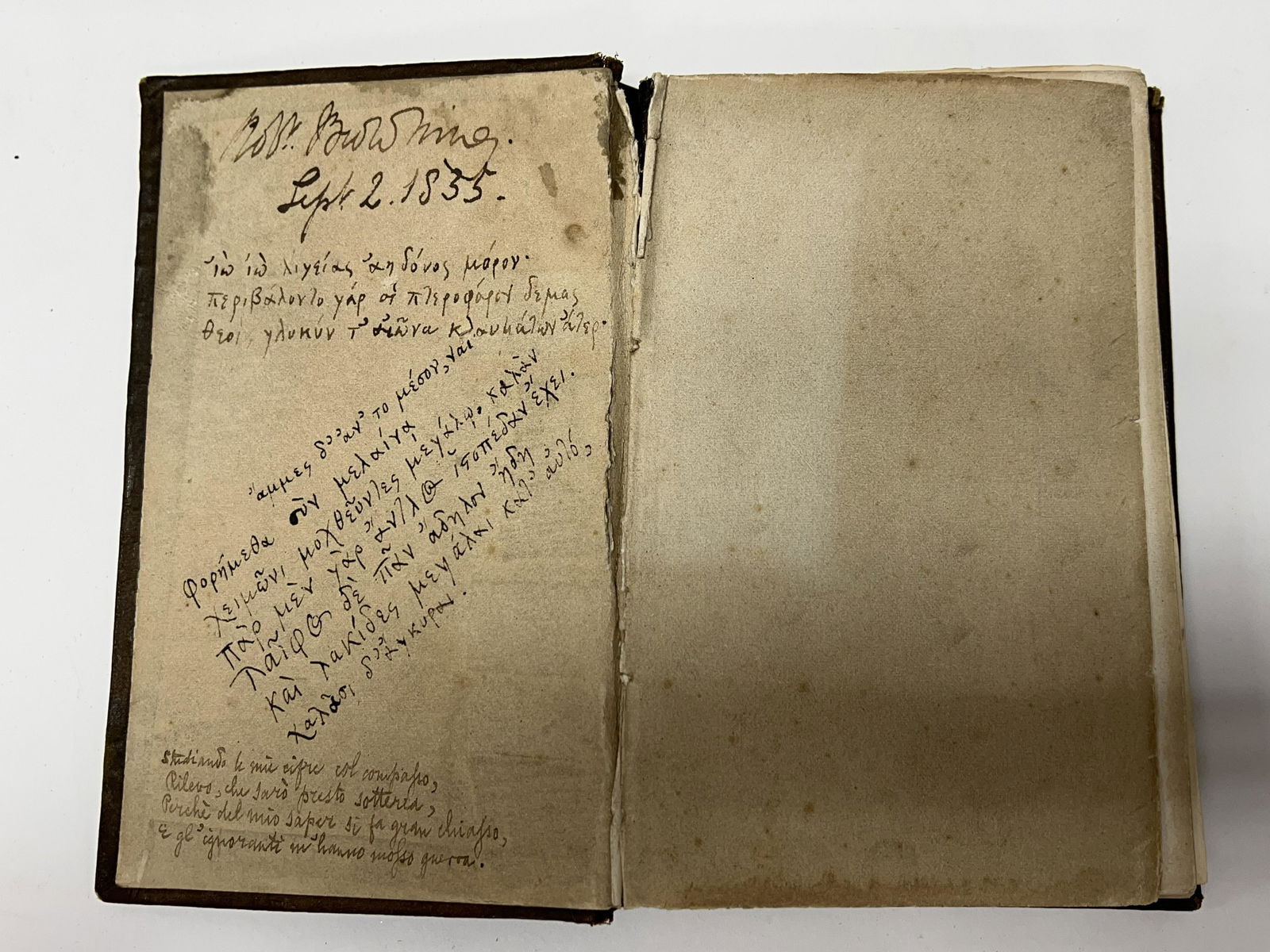 A cloth bound book, inscribed on the inside cover Robert Browning Sept 12, 1835 followed by to: A cloth bound book, inscribed on the inside cover Robert Browning Sept 12, 1835 followed by to passages of greek poetry and one in Italian, a pencilled inscription follows on the second page, gift by