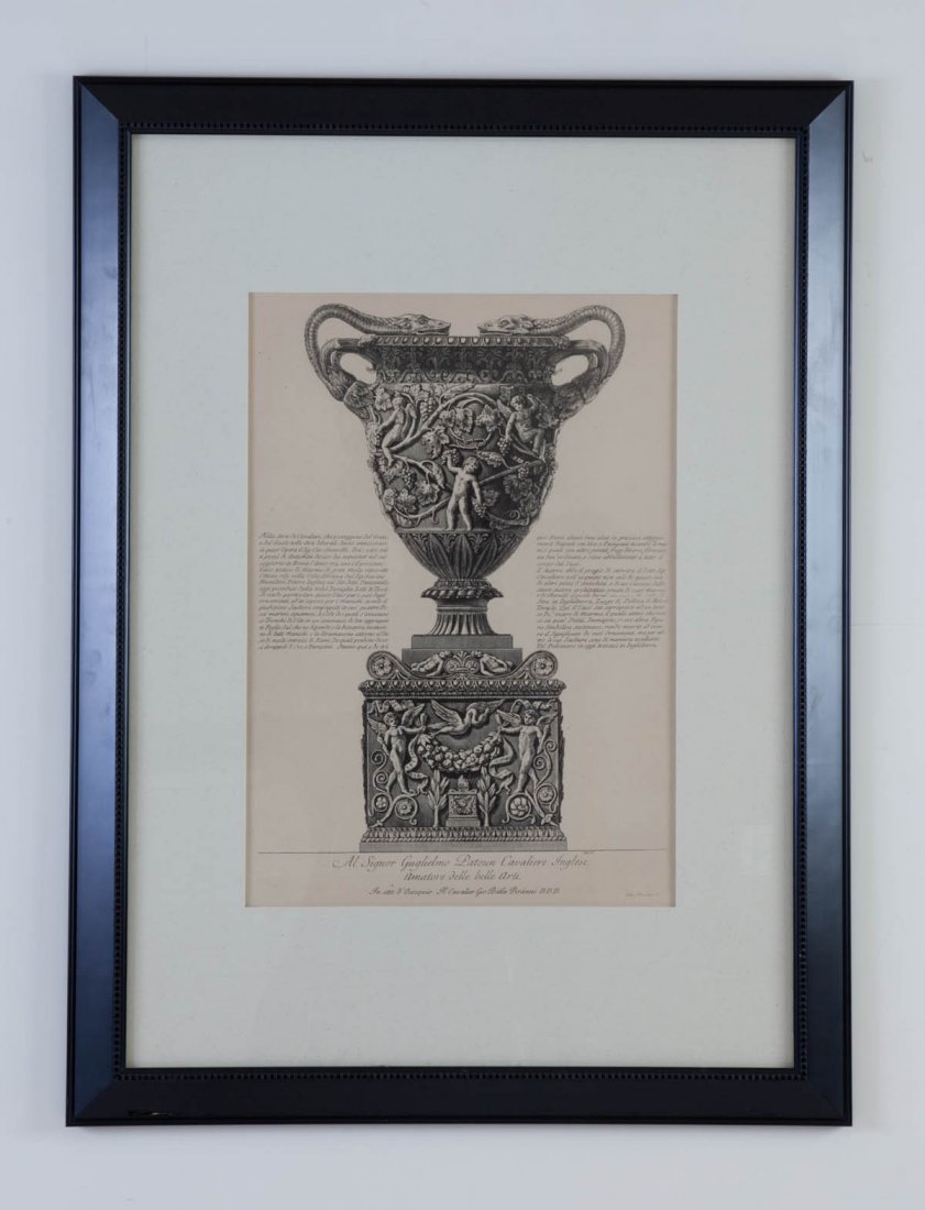 Piranesi Urn Print with Serphant Head Handles: The body decorated with cherubs and grape vines, square pedestal base with angels and garlands, Matted and framed. height 36in; width 25in